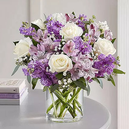 Purple and White Floral Bunch In Glass Vase